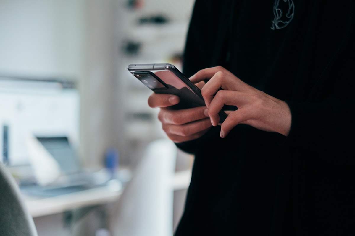 Traveler using messaging apps on a smartphone